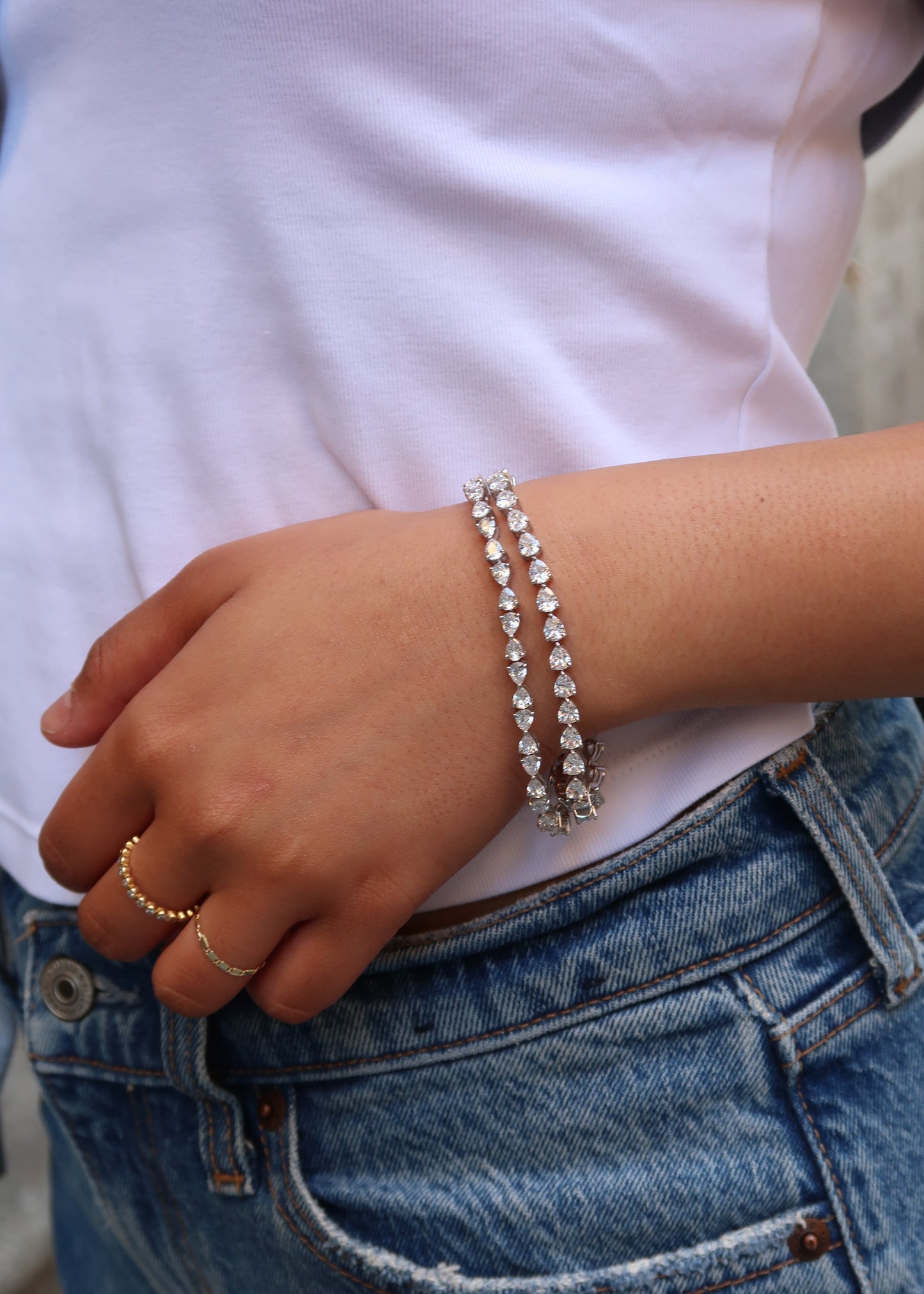 Dewdrop Inverted Pear Tennis Bracelet lifestyle — sterling silver — Stone Symphony