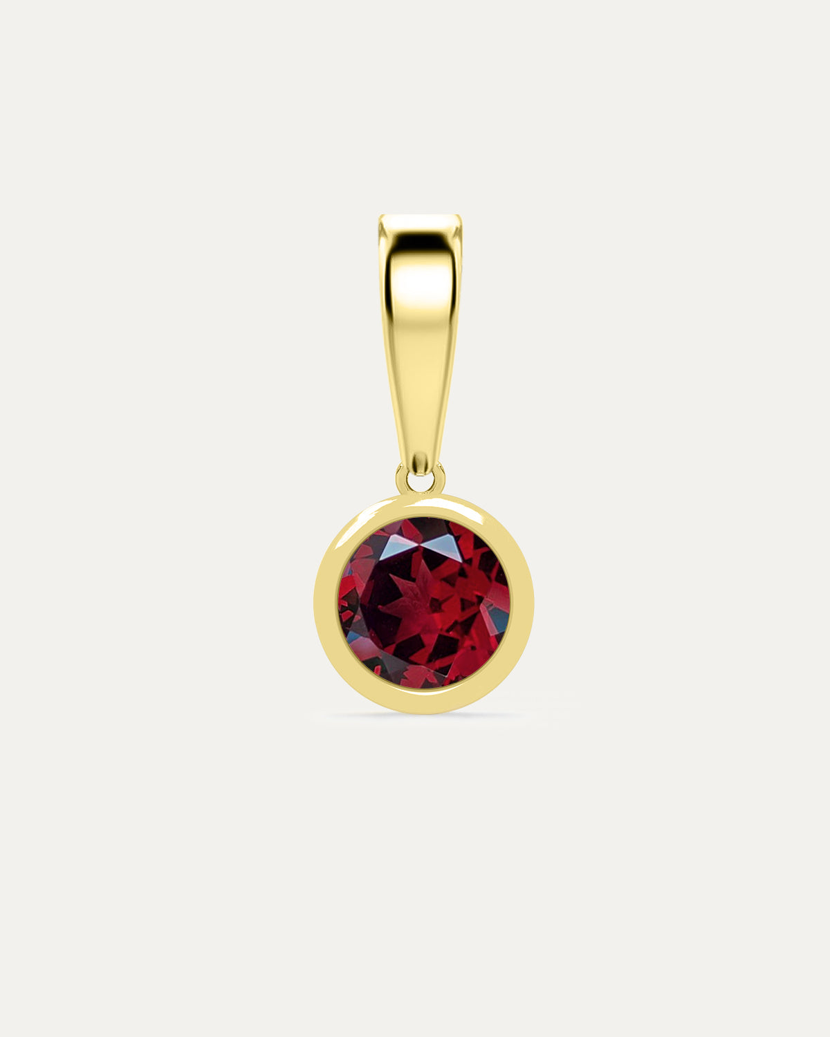 Aurelle Bezel Birthstone Charm in Garnet — deep red garnet bezel-set in yellow gold with polished bail, studio product shot — Stone Symphony