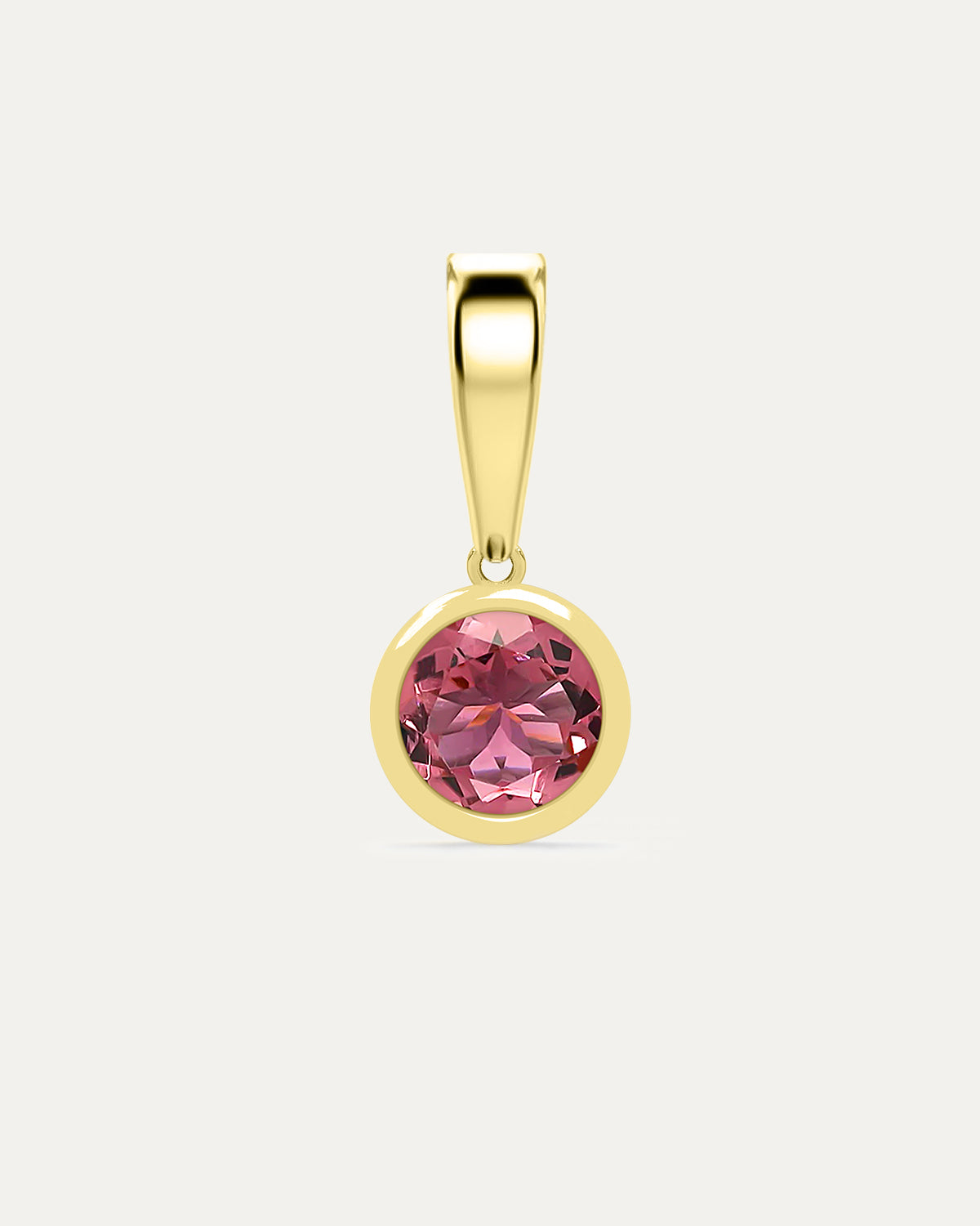 Aurelle Bezel Birthstone Charm in Pink Tourmaline — soft pink tourmaline bezel-set in yellow gold with polished bail, studio product shot — Stone Symphony