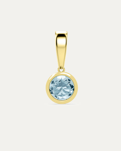 Aurelle Bezel Birthstone Charm in Aquamarine — sky blue aquamarine bezel-set in yellow gold with polished bail, studio product shot — Stone Symphony