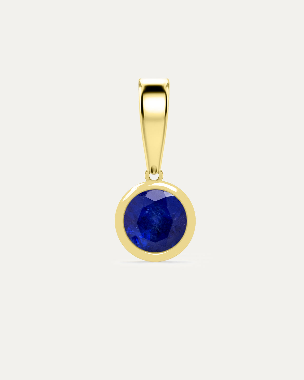 Aurelle Bezel Birthstone Charm in Blue Sapphire — deep blue sapphire bezel-set in yellow gold with polished bail, studio product shot — Stone Symphony