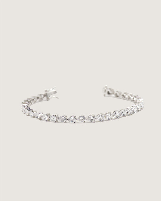 Dewdrop Pear Tennis Bracelet — pear-shaped stones in sterling silver, product shot — Stone Symphony