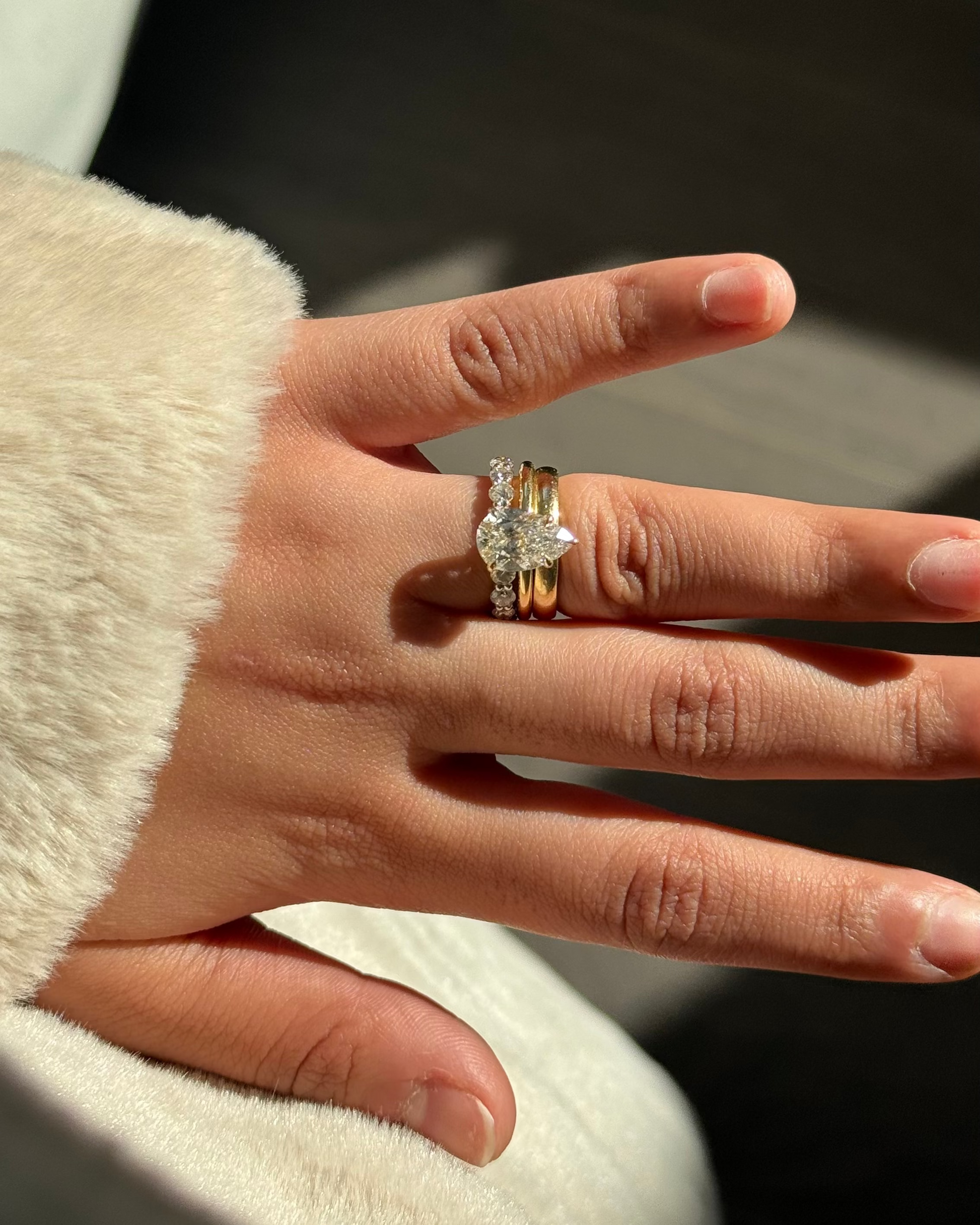 Pear Diamond Solitaire Ring lifestyle — large pear-cut diamond — Stone Symphony