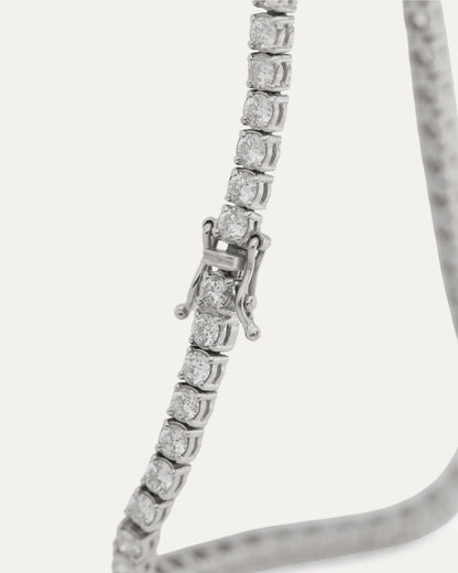 Classic Diamond Tennis Bracelet 14K white gold — close-up showing round brilliant diamonds and box clasp — Stone Symphony