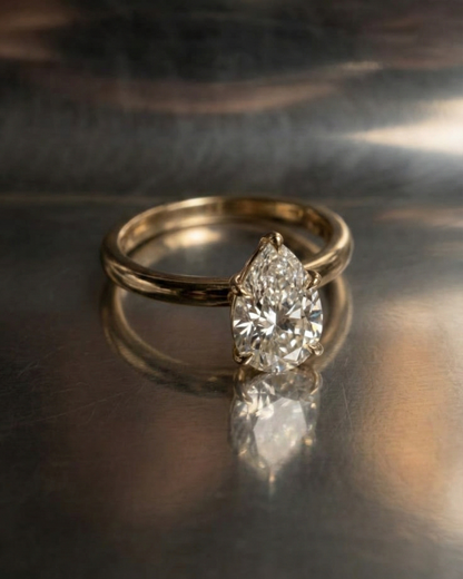Pear Shaped Diamond Engagement Ring — yellow gold solitaire — Stone Symphony